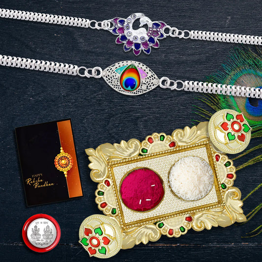 Stylish Silver Rakhi Gift Combo – 2 Designer Rakhis (Peacock & Swan), Chocolates, Coin, Tikka Set & Greeting Card